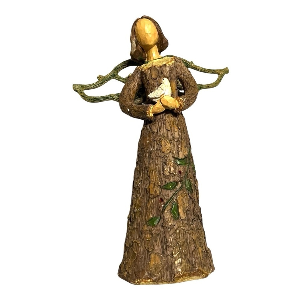 Peacefull Angel holding dove grapevine wings white berries holly skirt resin 12”